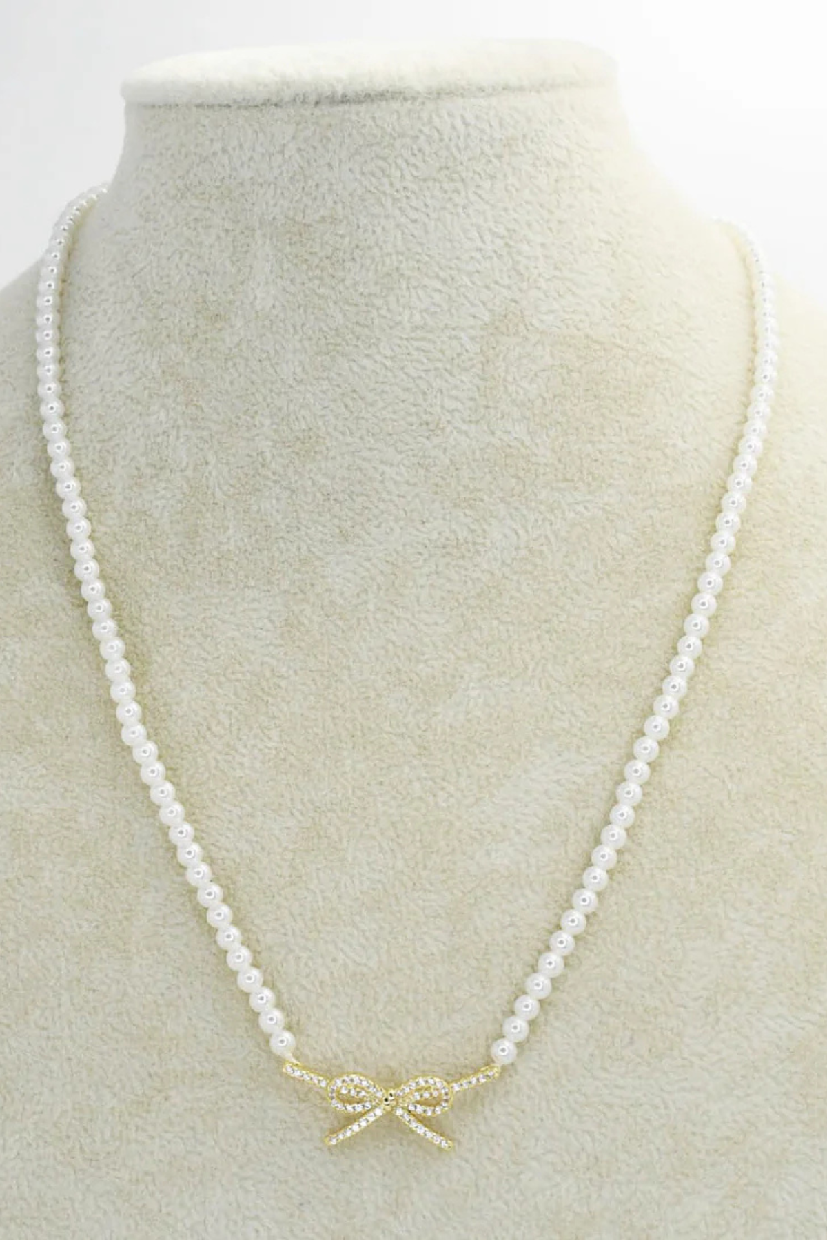 Pearl Elegance Gold Bow Necklace