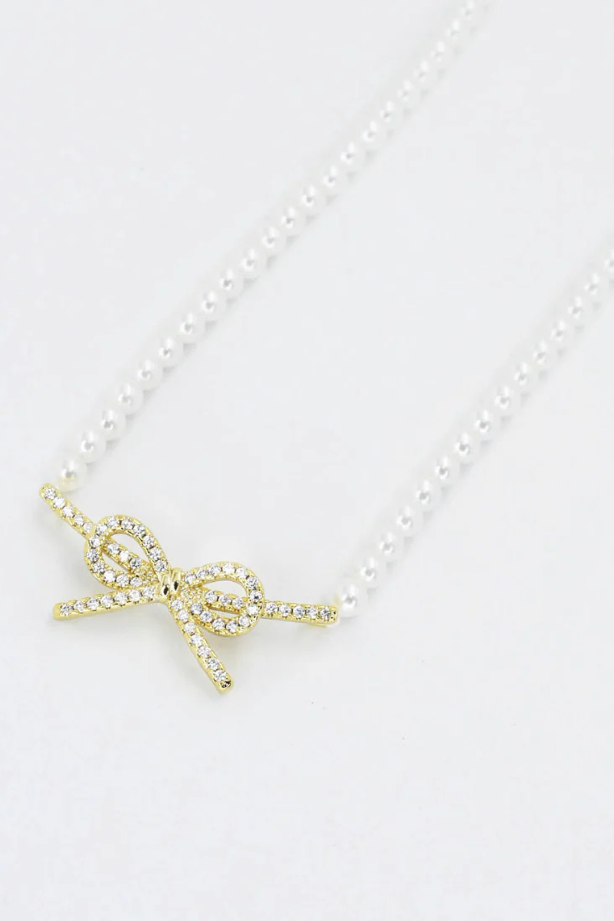 Pearl Elegance Gold Bow Necklace