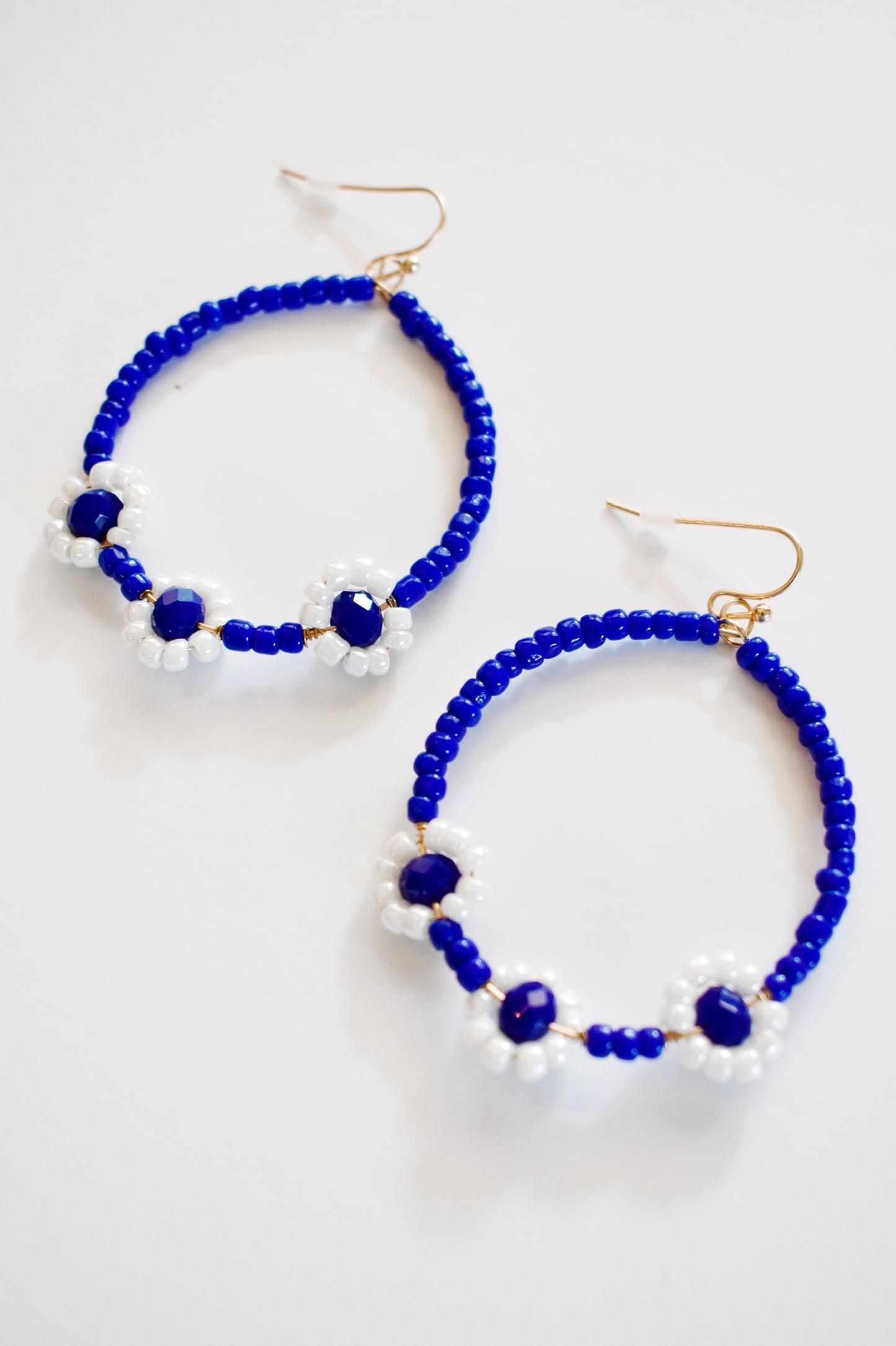 Load image into Gallery viewer, Blue Flower Beaded Hoops
